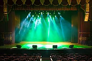 concert stage lit in green